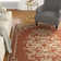 Rockingham Oriental Hand Hooked Rust/Multi Area Rug