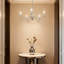 Lustre moderne avec 5 lumières et bras courbés, hauteur de suspension réglable, finition nickel brossé pour le vestibule et le salon