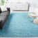 Hermina Light Turquoise Area Rug