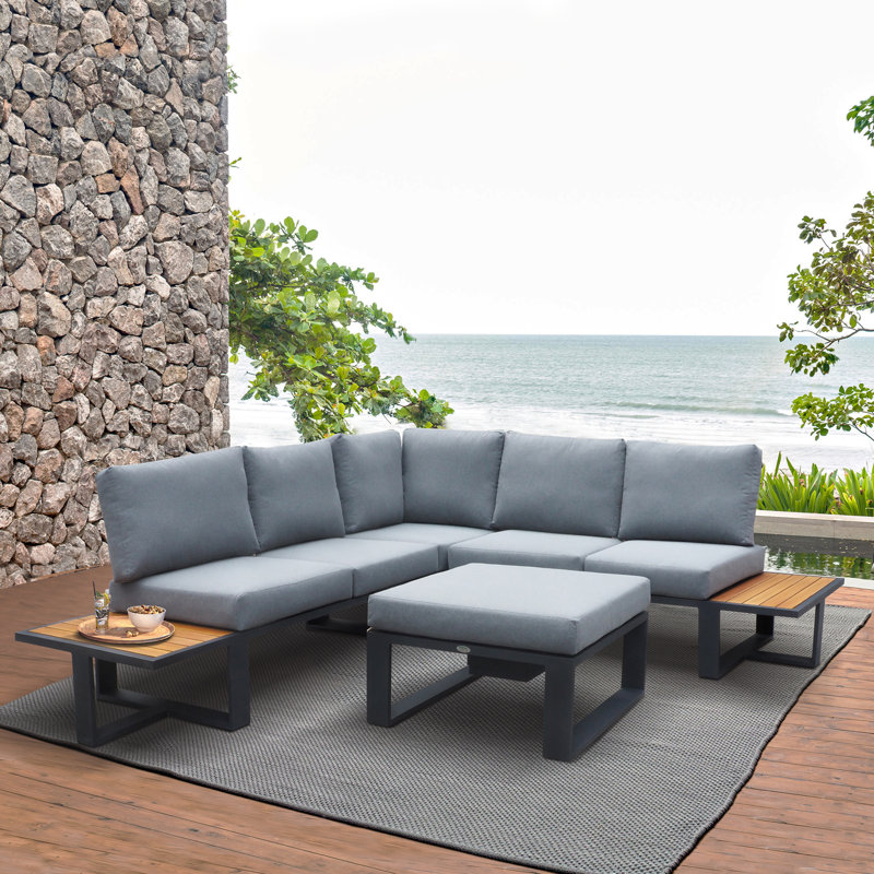 Ensemble modulaire d'extérieur 4 pièces avec coussins gris foncé et table basse