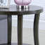 Table basse ovale avec plateau en bois manufacturé et tablette