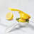 Tovolo Squeeze and Pour Citrus Press with Built-In Pour Spout and Nylon Strainer, White and Yellow
