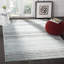 Tapis sarcelle / gris Cohn-27042993