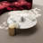 39" Round Stone Coffee Table with Metal Cylinder Legs - Modern Luxury, Space-Saving Design