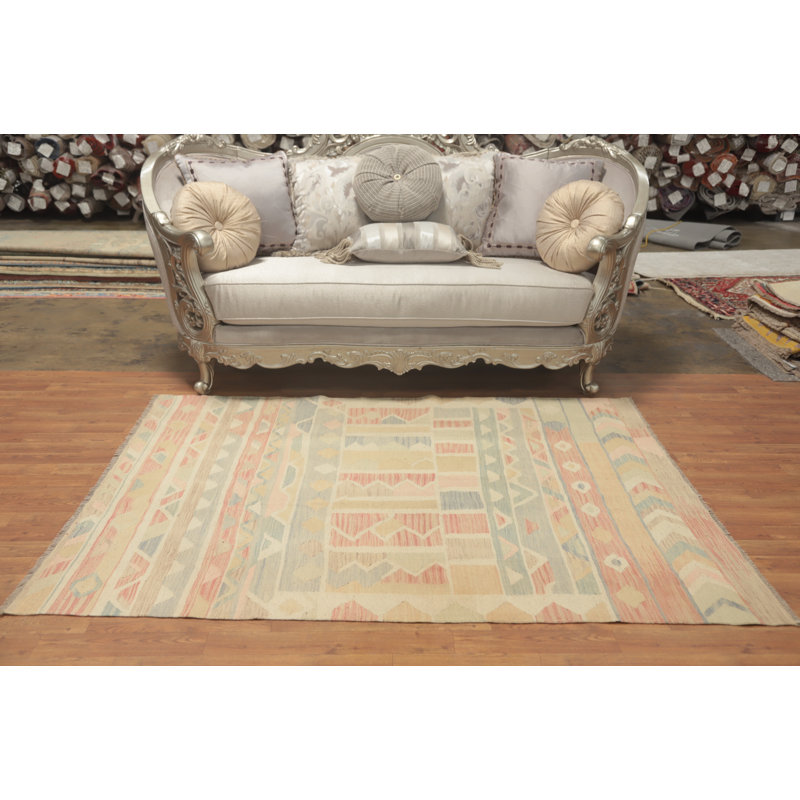 Délicat tapis géométrique pastel 5 x 6 pour un espace de vie serein