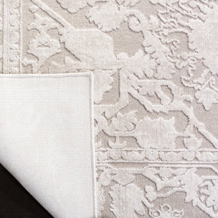 Calidia Oriental Cream/Ivory Area Rug