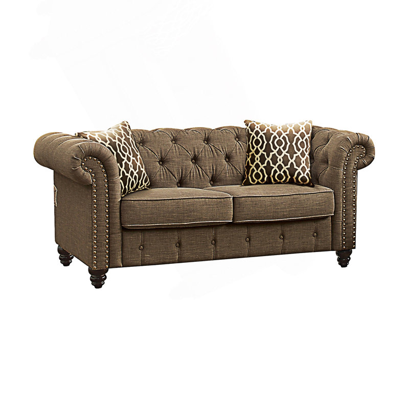 Chesterfield Style Loveseat With Two Accent Pillows