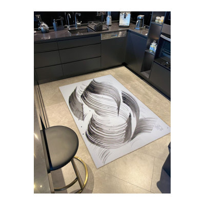 Tapis tissé lavable à la machine
