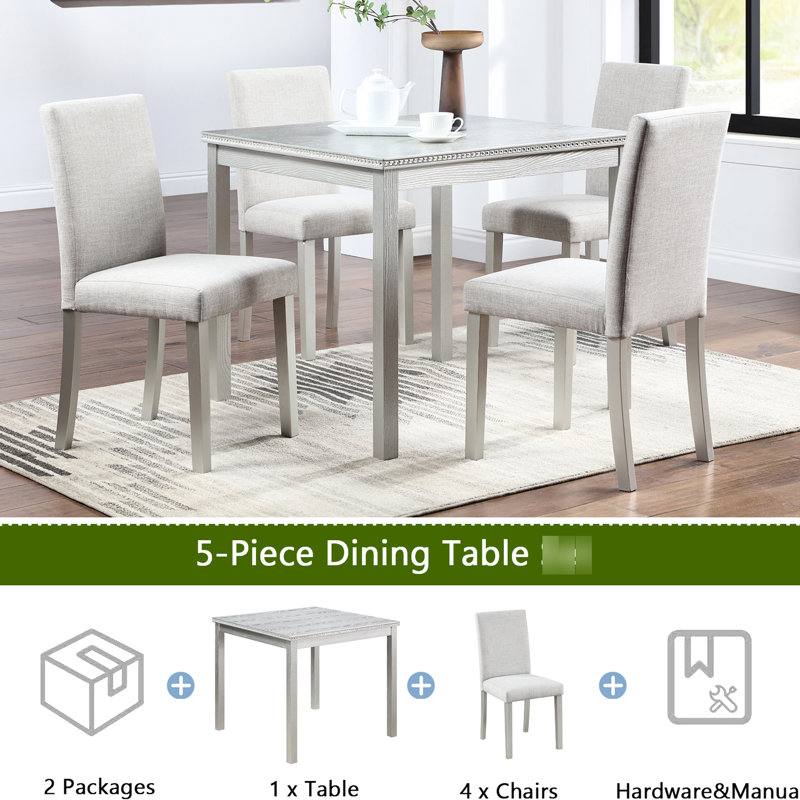 Élégante table de salle à manger gris argentée avec 5 pièces, y compris des sièges rembourrés ergonomiques et des sièges confortables en bois
