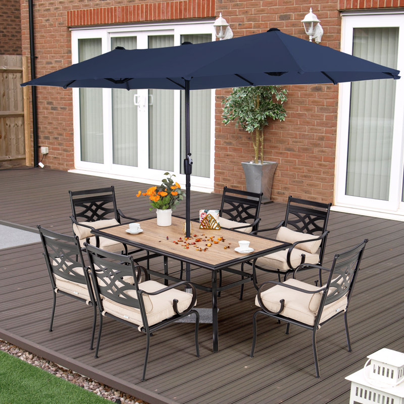 Leonard 6 - Person Patio Dining Set with Rectangular Table , Cushions Included, Beige