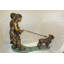 Statue deux enfants promenant un chien en bronze - Taille: L 55 po x l 28 po x H 37 po.