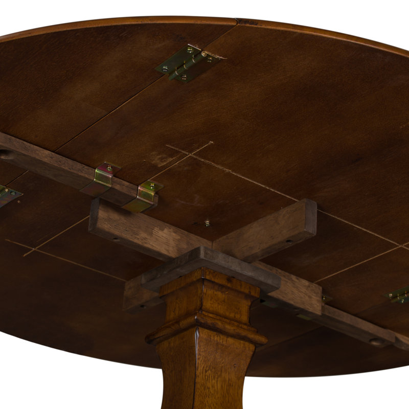 Knaack Extendable Round Solid Wood Dining Table
