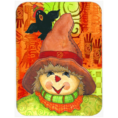 Planche à découper en verre à caroline et verre d’automne épouvantail