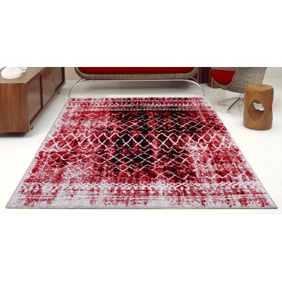 Tapis abstrait rouge / noir Mangassa