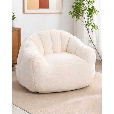 Sink into ultimate comfort with our Plush Sherpa Lounge Chair – your perfect spot for reading, gaming, or just relaxing. Soft, cozy, and oversized for all-day lounging."