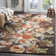 Emrick Blossom Hand Hooked Wool/Cotton/Latex Floral Rug in Brown
