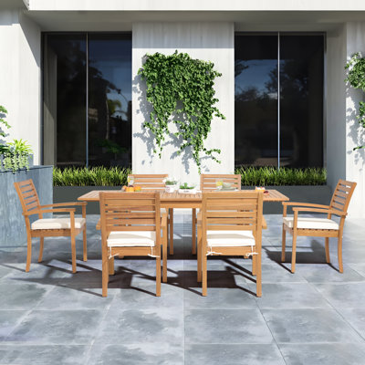 Kilani 6 - Person Acacia Wood Patio Dining Set with Extendable Rectangular Table , Cushions Included