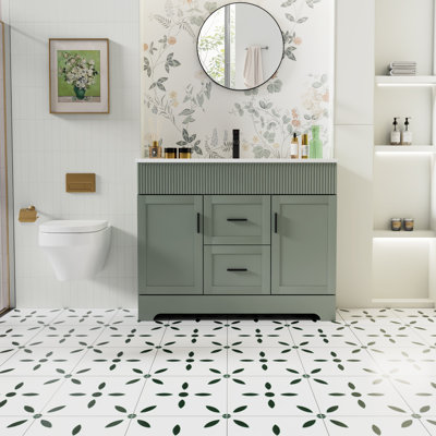 Meuble-lavabo autoportant Breonica de 42 po avec lavabo intégré en résine, design cannelé moderne, fini laqué PU résistant à l'eau, portes et tiroirs à fermeture amortie pour la rénovation de votre salle de bain.