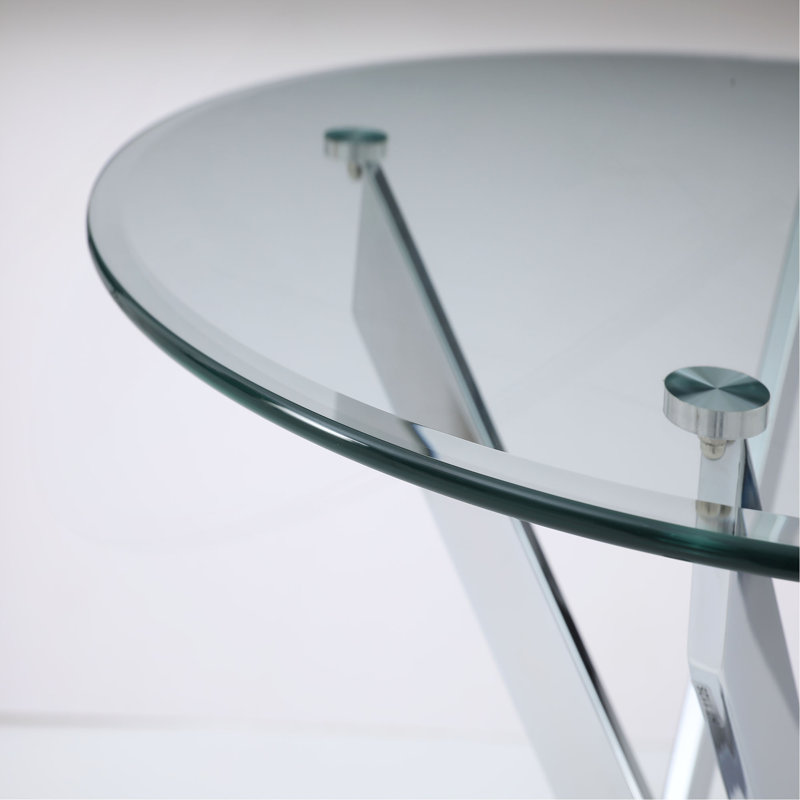 Le plateau de table circulaire en verre trempé moderne est jumelé à un cadre en fer mesurant 35,43 pouces de longueur.