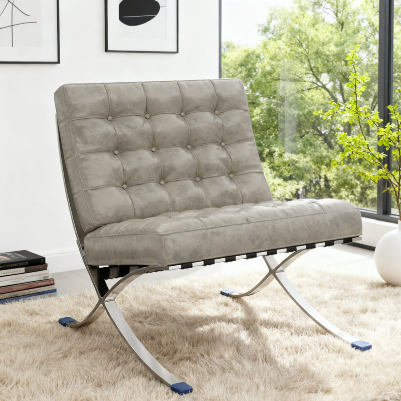 Fauteuil d'appoint moderne capitonné en cuir synthétique gris avec structure en acier inoxydable, Gris