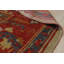 Tapis rouge noué à la main