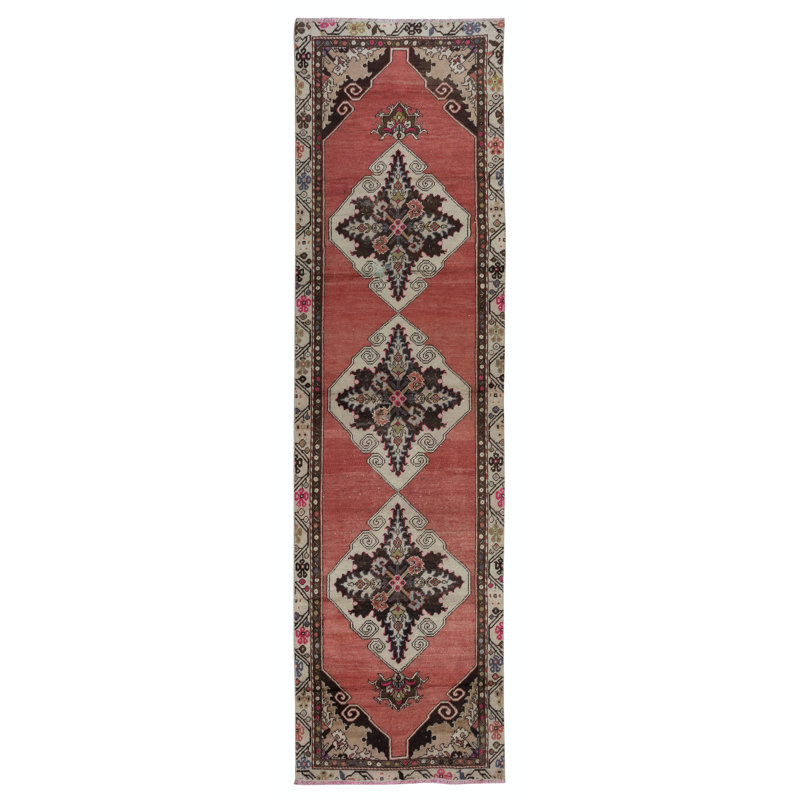 Tapis de couloir rouge noué à la main avec médaillons colorés