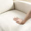 Chaise berçante moderne à accoudoirs de salon à haut dossier avec deux poches latérales pour un usage relaxant et pratique