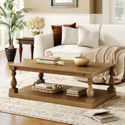 Table basse rétro avec pieds artistiques et finition luxueuse pour les salons et les bureaux