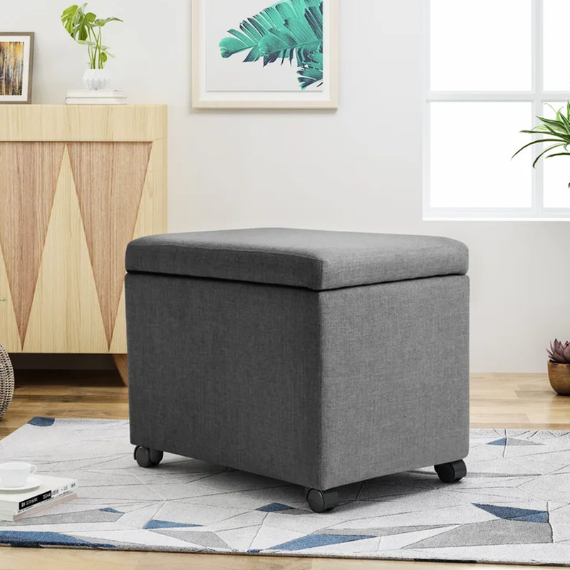 Rangement en tissu gris, offrant de meilleures options pour le tissu de la maison et du bureau avec roulettes