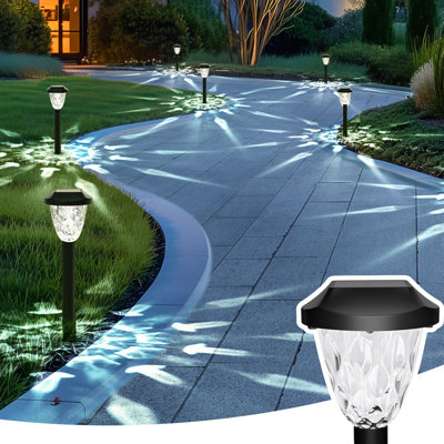 Paquet de 16 lumières solaires extérieures, éclairage de sentier solaire blanc froid auto marche / arrêt imperméable pour pelouse, jardin et allée