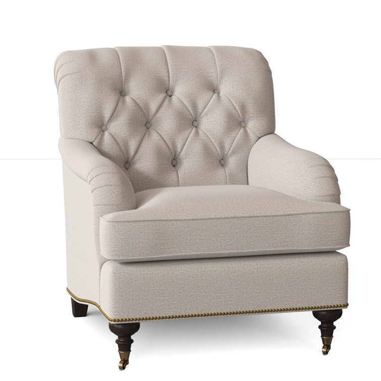 Fauteuil à coussin en duvet capitonné Devan