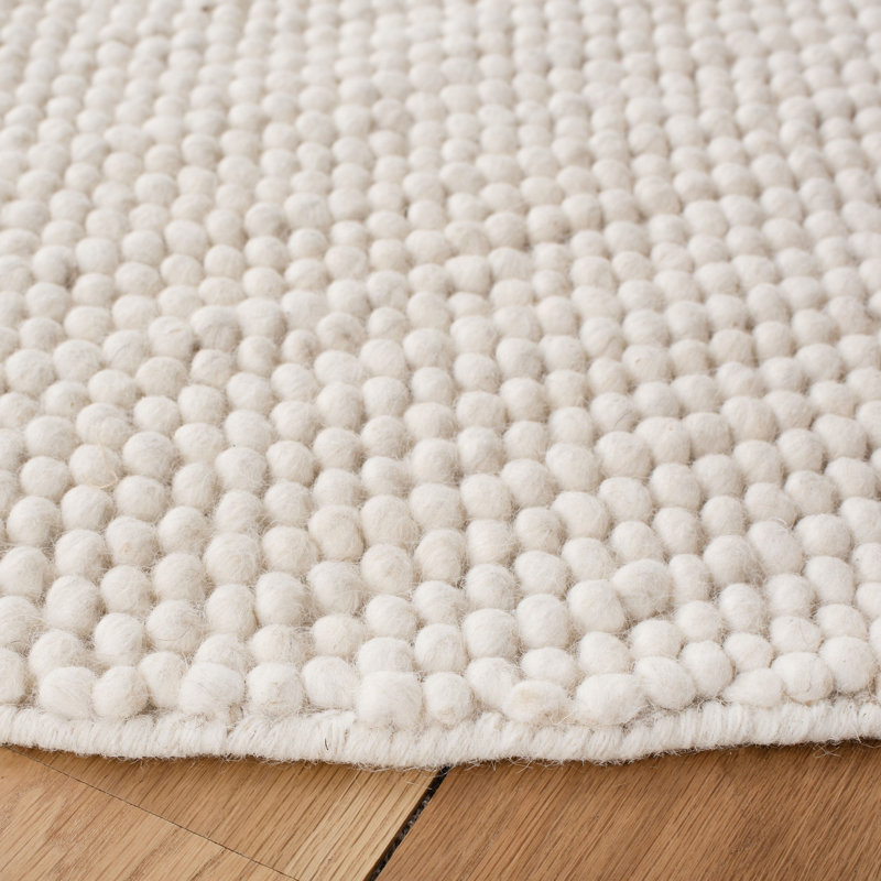 Tapis ivoire fait à la main de couleur unie Sitte, Rond 10 pi
