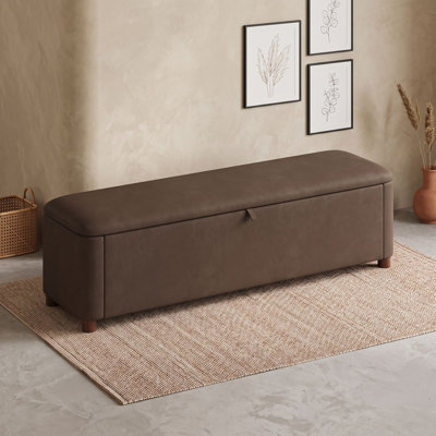 Banc ottoman de rangement avec pieds en bois d'hévéa massif et siège rembourré relevable, idéal au pied du lit ou dans une entrée.