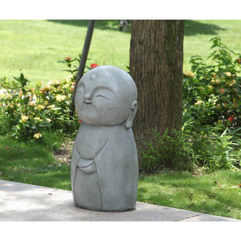 Statue Jizo japonais heureux souriant