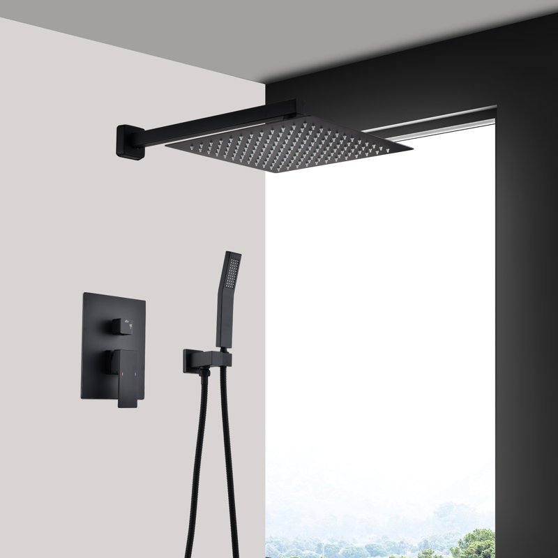 Pomme de douche murale noire matte de 12 po - La buse autonettoyante maintient la sortie d'eau non obstruée. Laiton s'aligne avec les raccords de tuyau American Standard.