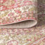 Tapis rose avec médaillon géométrique décoratif Peregrine-467013890