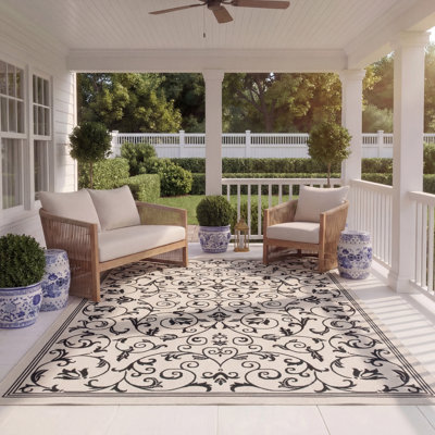 Arneshia Floral Sand/Black Indoor / Outdoor Area Indoor/Outdoor Area Rug