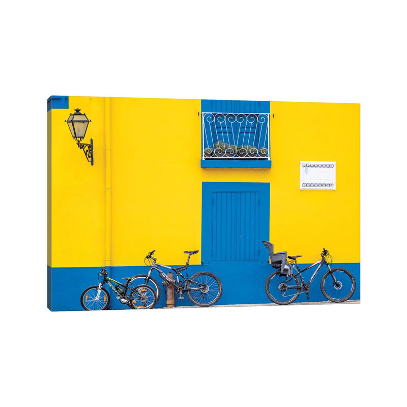 Yellow House With Blue Shutters, Windows And Doors, Aveiro, Portugal by Julie Eggers - Wrapped Canvas Print