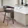 Robinett Swivel Counter or Bar Height Bar Stool with Arms and Footrest in Faux Leather and Metal