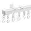 White curtain track with attached silver metal S-hooks