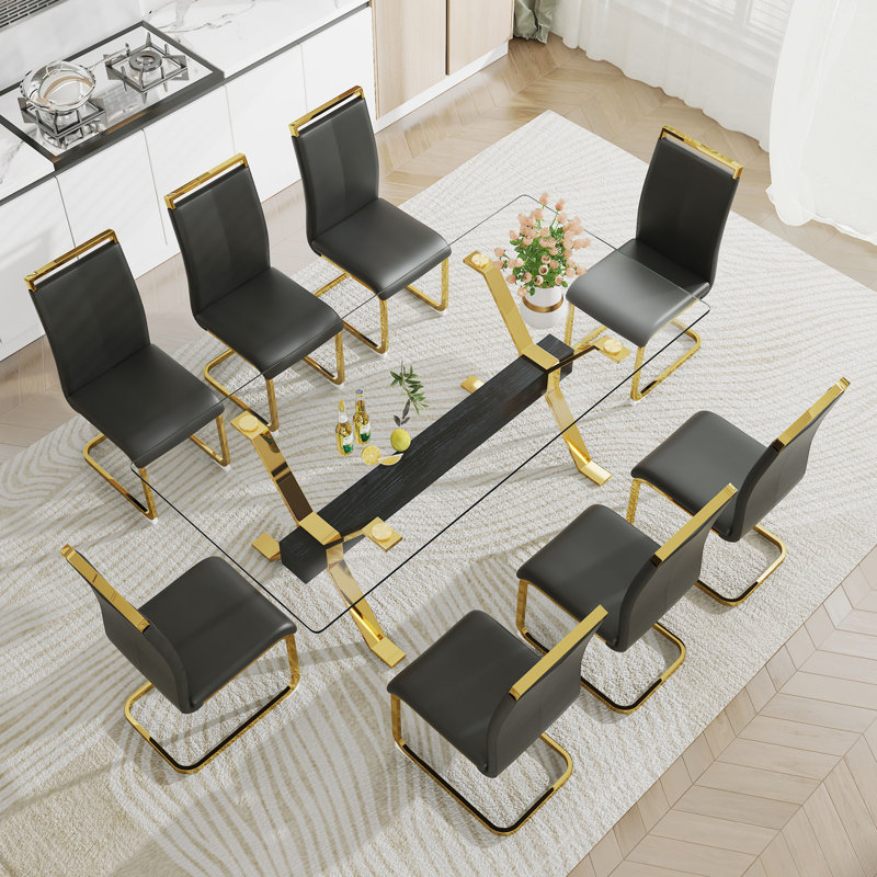 1 table et 8 chaises. Table de salle à manger rectangulaire moderne en verre trempé de luxe avec 8 chaises en polyuréthane plaqué or noir