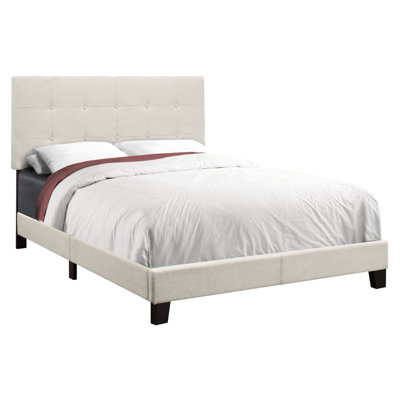 Lit double tapissier pleine grandeur en magnifique lin beige avec pieds en bois noir
