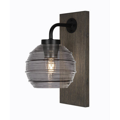 Oxbridge Wall Sconce Shown In Graphite & Painted Distressed Wood-look Metal Finish With 6" Smoke Ribbed Glass