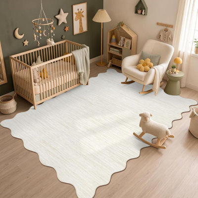 Tapis festonné à bordure festonnée