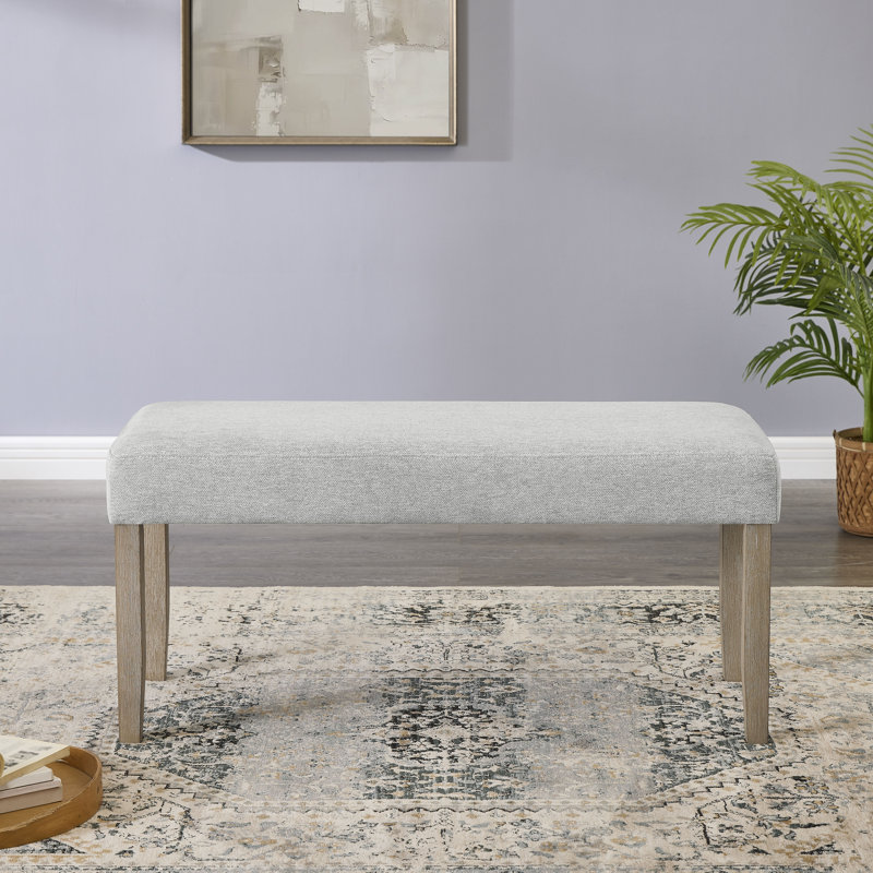 Banc rembourré Dunton, tissu gris clair avec pieds en bois d'hévéa