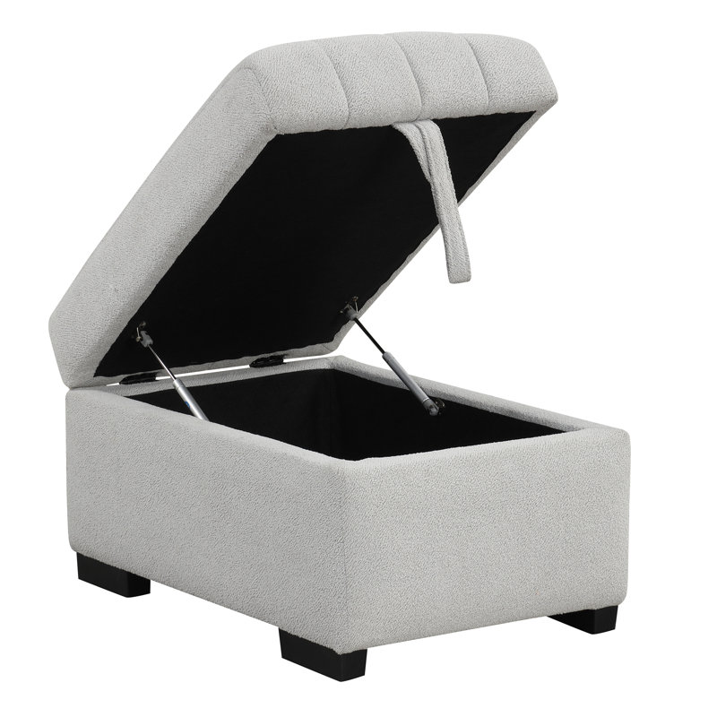 Lit escamotable en L en gris, avec rangement mobile, ports et prises de courant pour un canapé-lit de bureau gris bien rangé, rangement équipé, ports, coussin