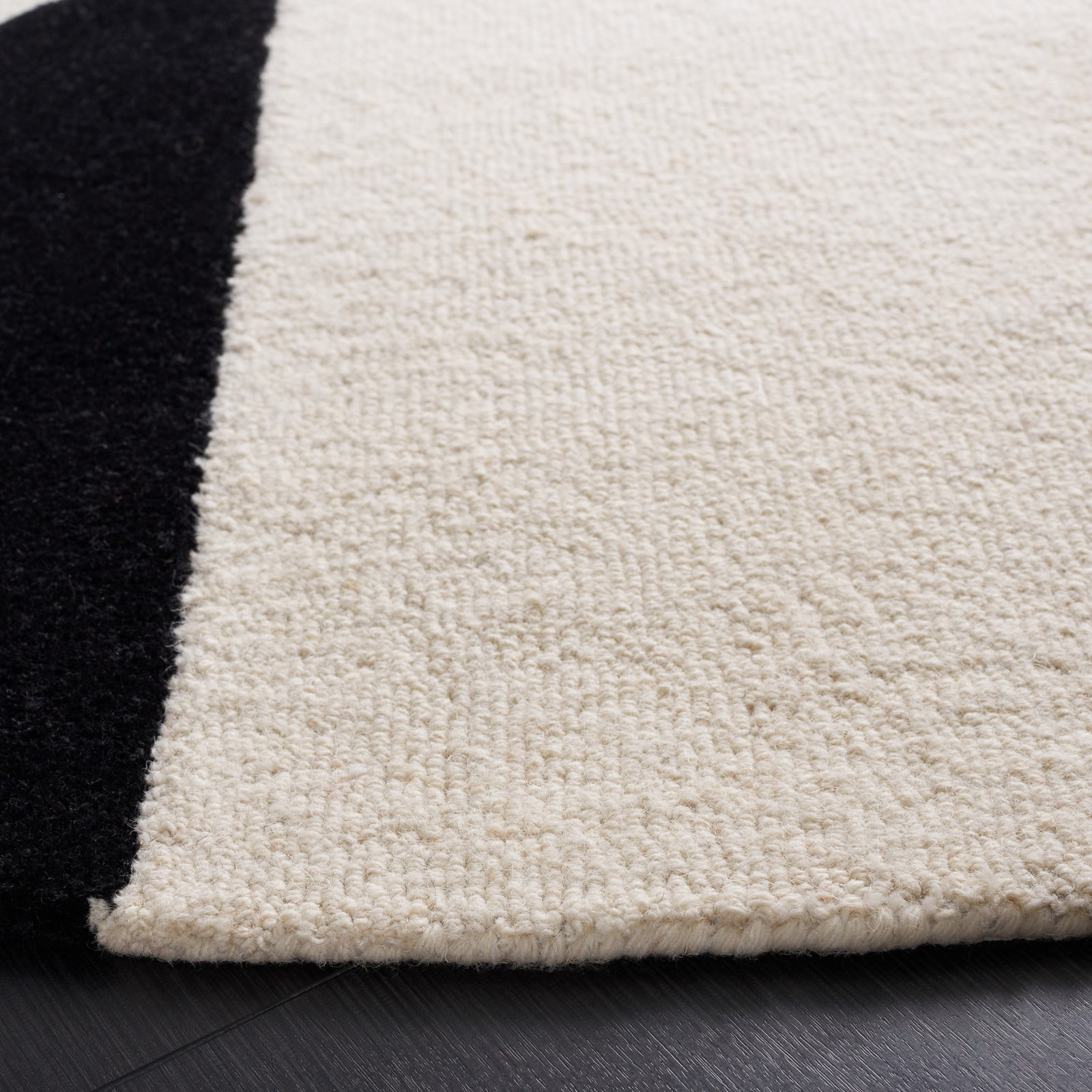 Felipe Rust Black Hand-Woven Wool Geometric Rug, Round 6'