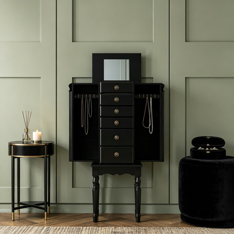 Armoire à bijoux en ébène avec finition noire patinée, doublure en velours noir, portes latérales pivotantes, miroir rabattable et conception pleine longueur pour un rangement organisé