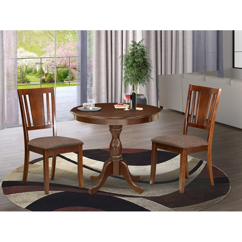 L'ensemble de 3 tables de salle à manger modernes comprend 1 table à piédestal ronde et 2 chaises de cuisine en similicuir acajou avec panneau arrière - finition acajou