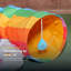 Tunnel de jeu pliable 2 en 1 pour chat arc-en-ciel avec coussin nuage, herbe à chat, papier froissé et balles suspendues